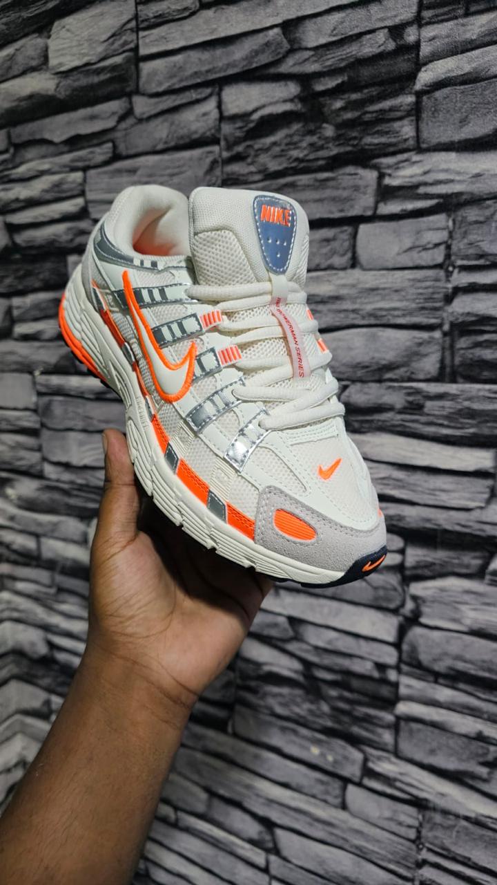 N P6000 - white, metallic silver, and orange